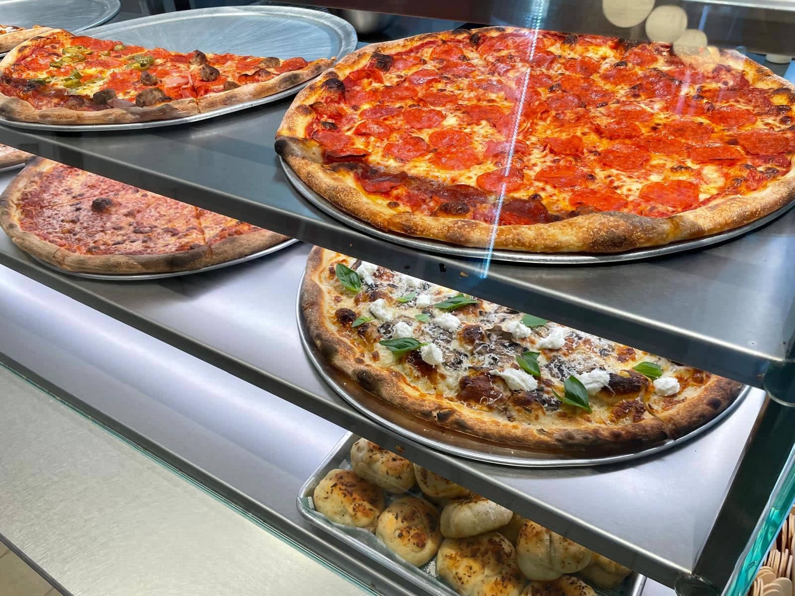 Assorted artisan pizzas at The Parlor Pizza